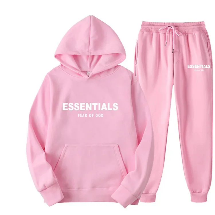 Pink Essentials Hoodie: Soft cotton blend in pastel pink, relaxed fit, perfect for casual outings or lounging at home."