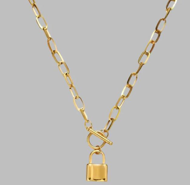 Charming Style: How to Rock a Gold Lock Charm Necklace